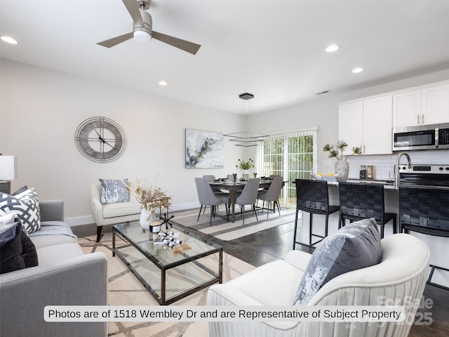 living room featuring ceiling fan