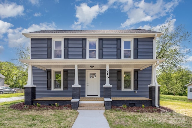 215 W Ketchie St W, China Grove, NC 28023 - view of front facade with covered porch