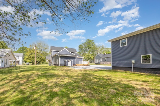 view of yard featuring a garage