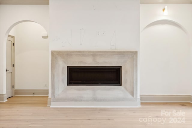 interior details featuring hardwood / wood-style floors