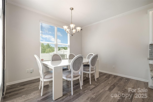 dining space featuring crown molding, dark hardwood / wood-style floors, and a notable chandelier