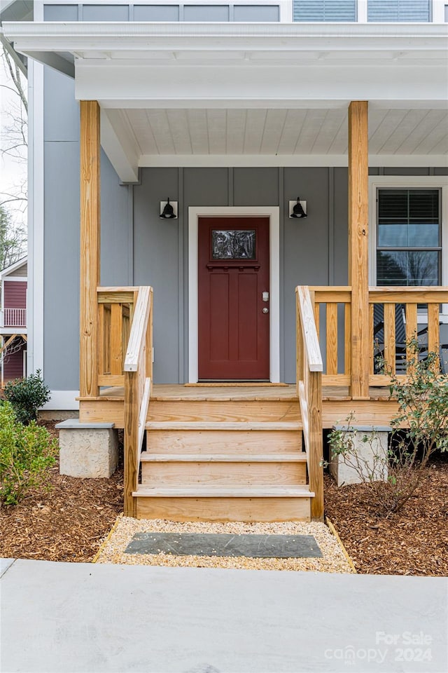 property entrance with a porch