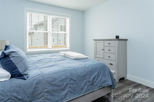 bedroom with multiple windows