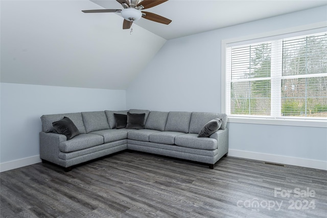 living room featuring ceiling fan, dark hardwood / wood-style floors, and lofted ceiling