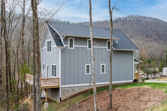 rear view of house with a deck