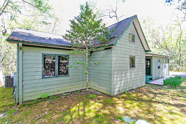 view of home's exterior featuring central air condition unit