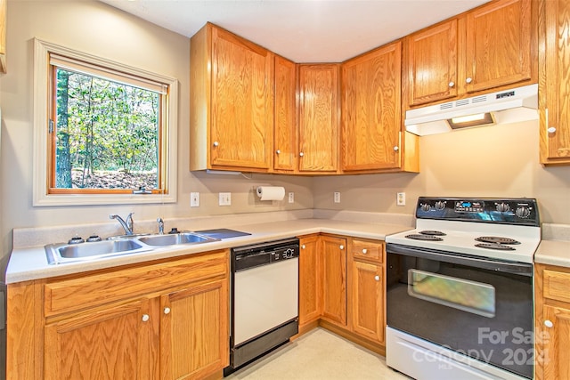 kitchen featuring sink and white appliances