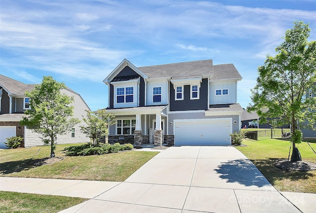 view of front of house with a garage and a front yard