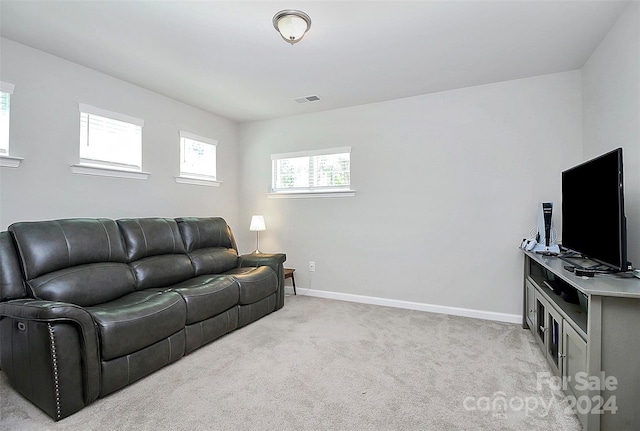 living room featuring light colored carpet