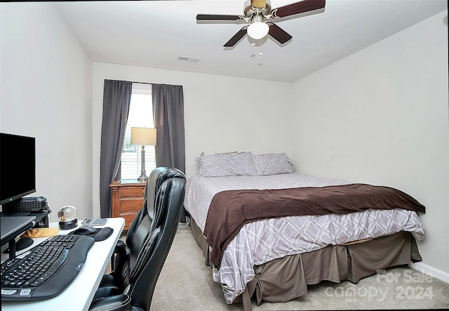 bedroom featuring ceiling fan and carpet flooring