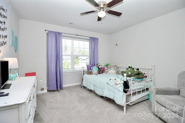 carpeted bedroom featuring ceiling fan