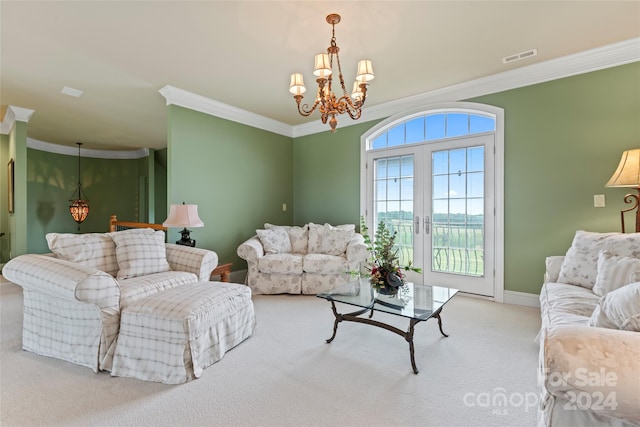 carpeted living room featuring french doors, crown molding, and an inviting chandelier