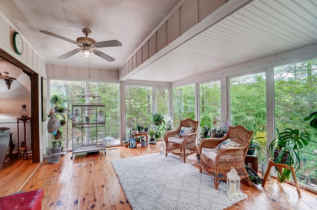 sunroom / solarium featuring ceiling fan and a wealth of natural light