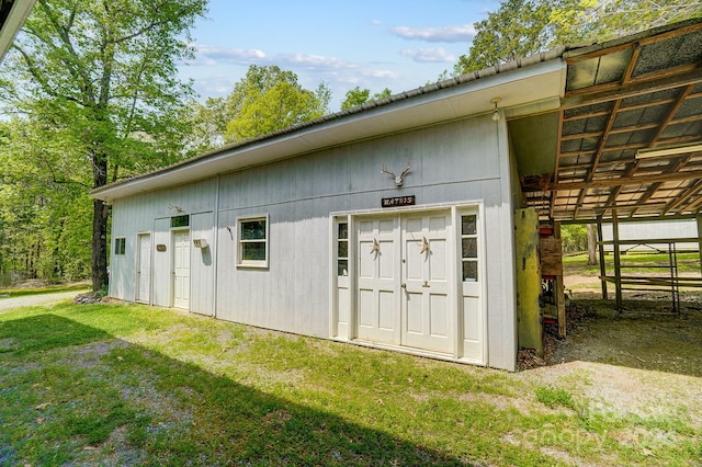 garage with a yard