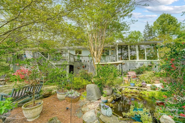 view of yard with a wooden deck