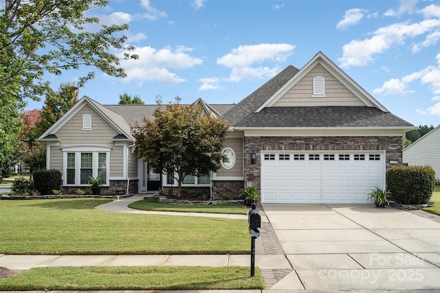 craftsman inspired home with a garage and a front lawn