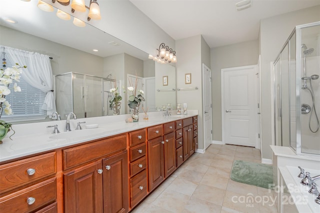 bathroom with vanity, shower with separate bathtub, and tile patterned flooring