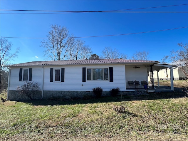 single story home with covered porch and a front yard