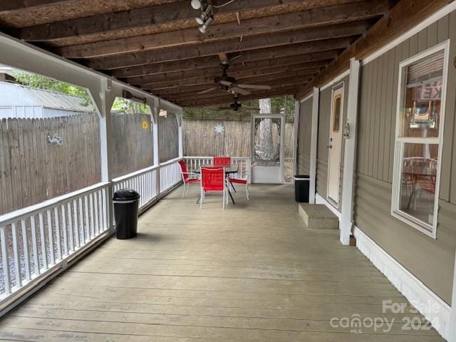 wooden terrace with ceiling fan