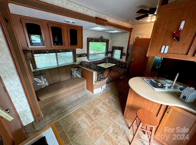 kitchen featuring ceiling fan