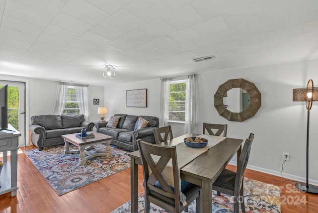 dining area featuring hardwood / wood-style floors and plenty of natural light