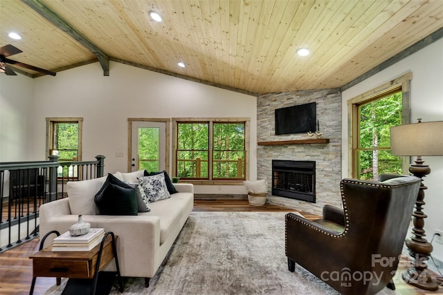 living room featuring light hardwood / wood-style floors, wood ceiling, and beamed ceiling