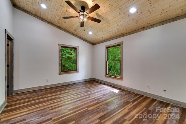 unfurnished room featuring ceiling fan, wood ceiling, vaulted ceiling, and dark hardwood / wood-style floors