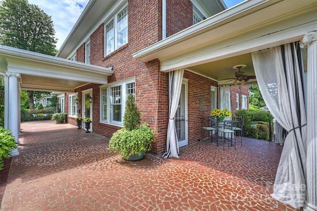 view of patio featuring ceiling fan