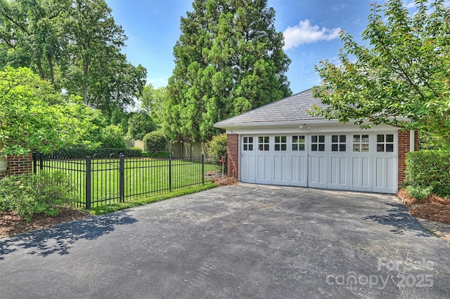 garage with a lawn