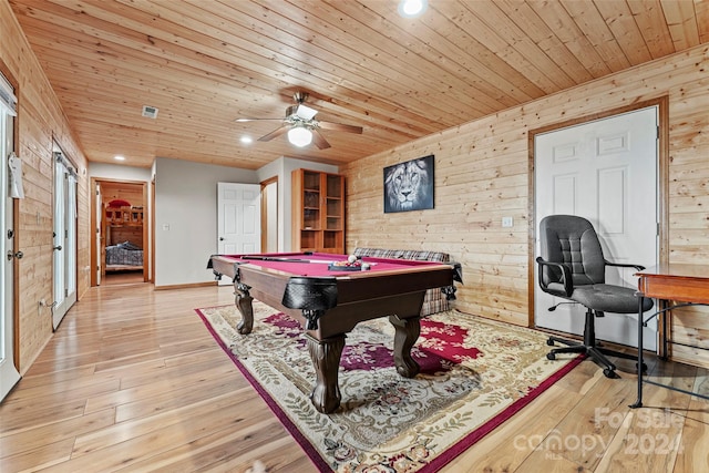 playroom featuring billiards, ceiling fan, light wood-type flooring, and wooden walls