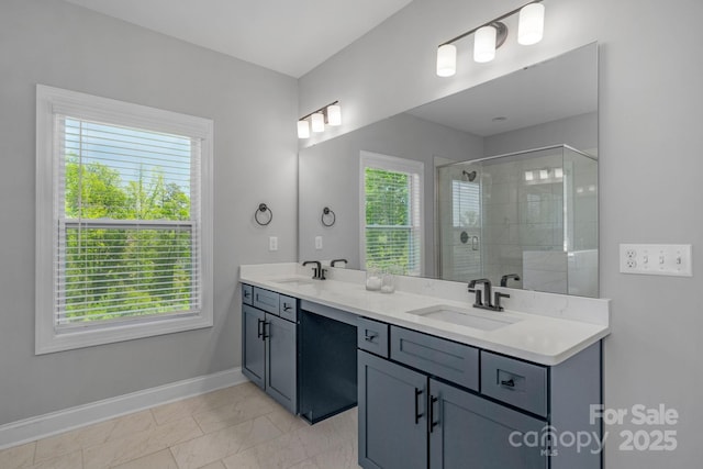 bathroom with vanity and walk in shower