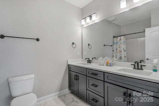 bathroom featuring toilet, a shower with shower curtain, and vanity