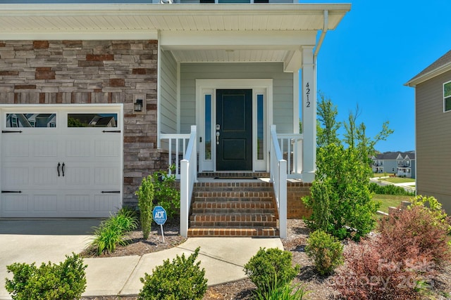 entrance to property featuring a garage