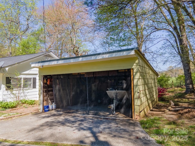 garage featuring a carport