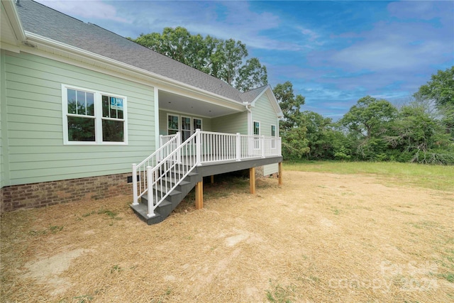 exterior space featuring a wooden deck