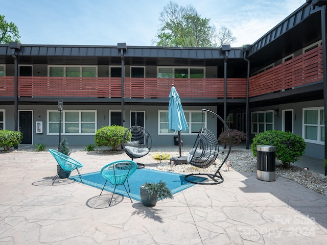 view of pool featuring a patio