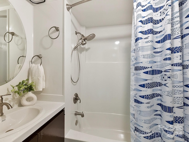 bathroom with vanity and shower / bath combo with shower curtain