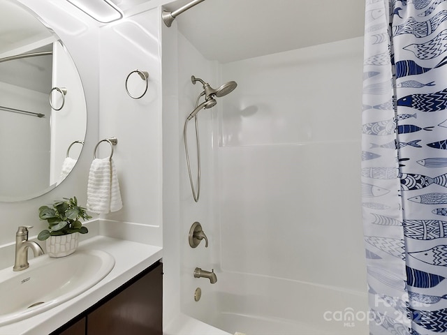 bathroom with oversized vanity and shower / tub combo with curtain