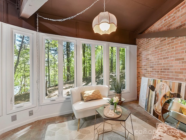 sunroom featuring a healthy amount of sunlight