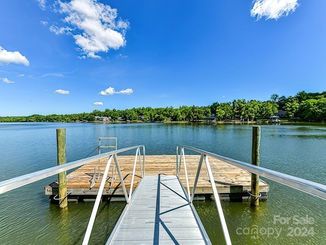 view of dock with a water view