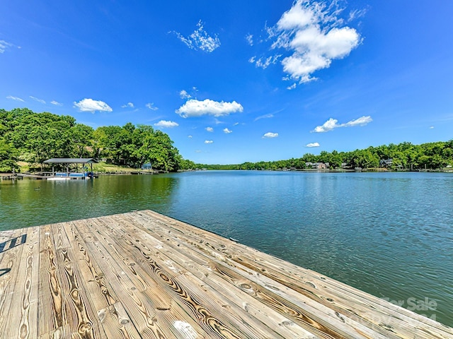 dock area featuring a water view