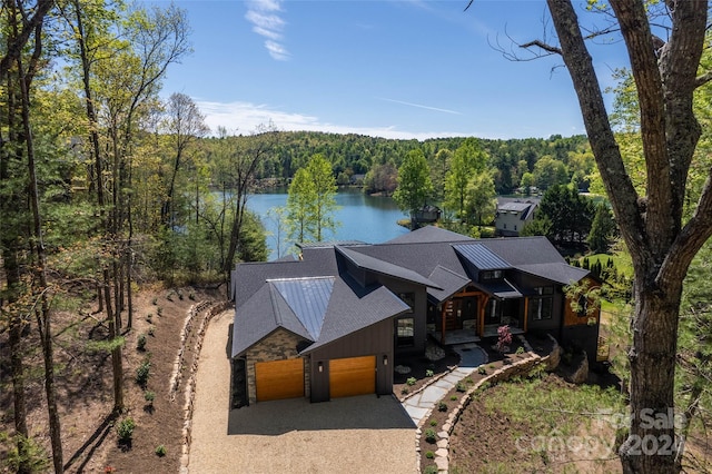 drone / aerial view with a water view