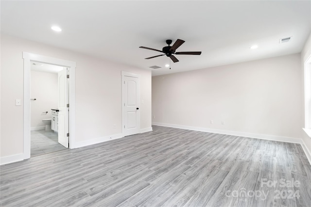 unfurnished room with light hardwood / wood-style floors and ceiling fan