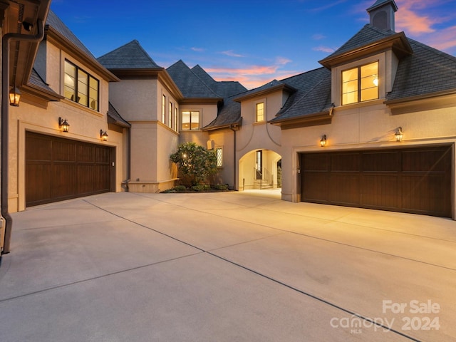 view of front of property with a garage