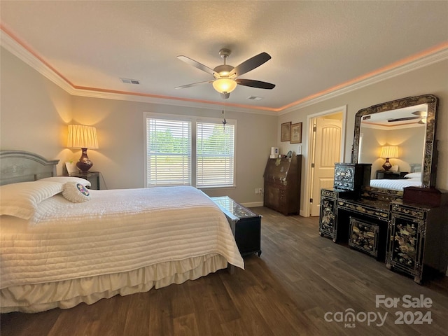 bedroom featuring ceiling fan, dark wood-type flooring, and crown molding