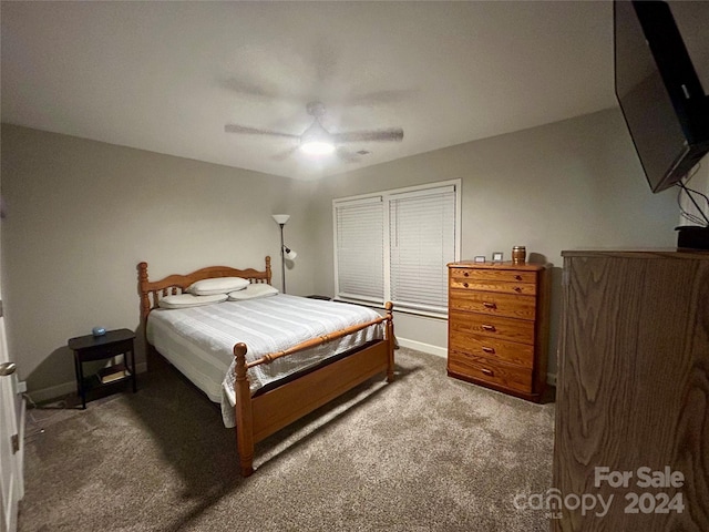 bedroom with ceiling fan and carpet flooring