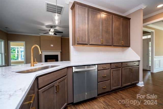 kitchen featuring stainless steel dishwasher, ceiling fan, dark hardwood / wood-style flooring, crown molding, and sink