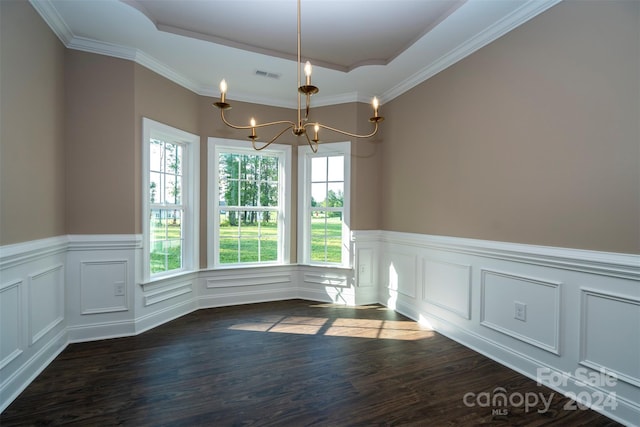 unfurnished dining area featuring a chandelier, dark hardwood / wood-style floors, and crown molding