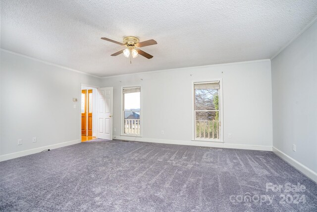 unfurnished room featuring ceiling fan, a textured ceiling, carpet flooring, and crown molding