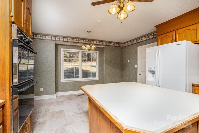 kitchen featuring ceiling fan with notable chandelier, white refrigerator with ice dispenser, light tile patterned flooring, double oven, and decorative light fixtures